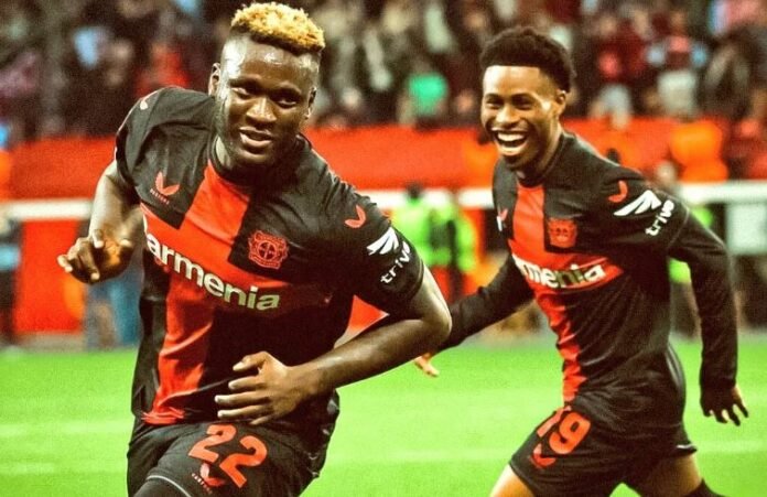 Victor Boniface and Nathan Tella celebrate during Bayer Leverkusen's 7-0 pre-season win over Sportfreunde Baumberg